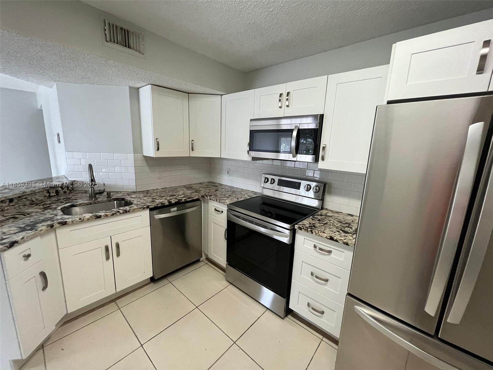 Completely updated two bedroom and two bath condo on the second floor. Unit is currently rented at $2100 per month.