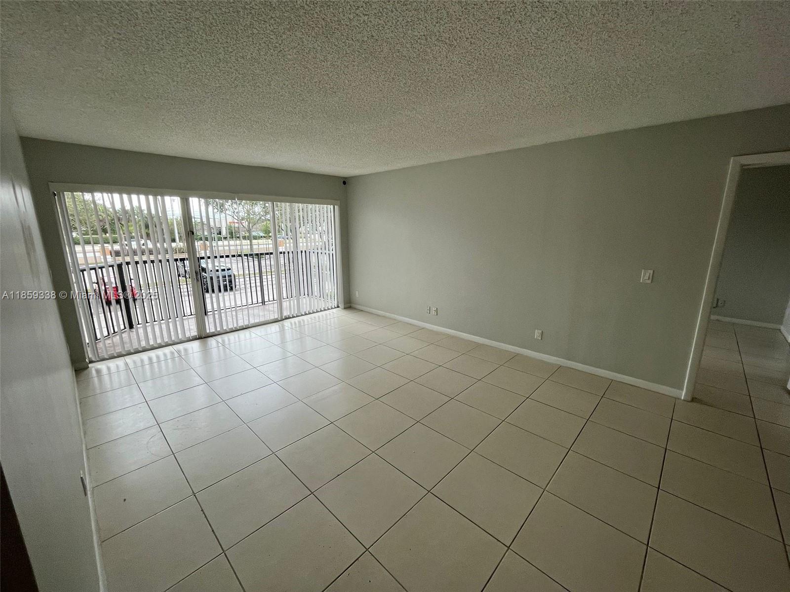 8821 Wiles Rd 203