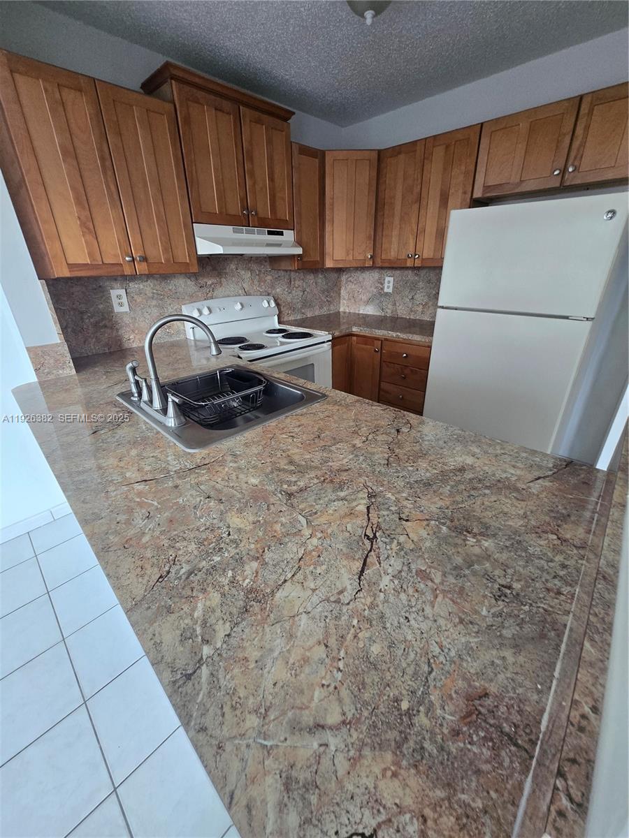 14831 SW 80th St 203-4