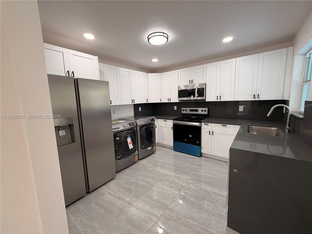 Photo of 809 NW 12th Ave, Fort Lauderdale, FL 33311 (MLS # A11962268)