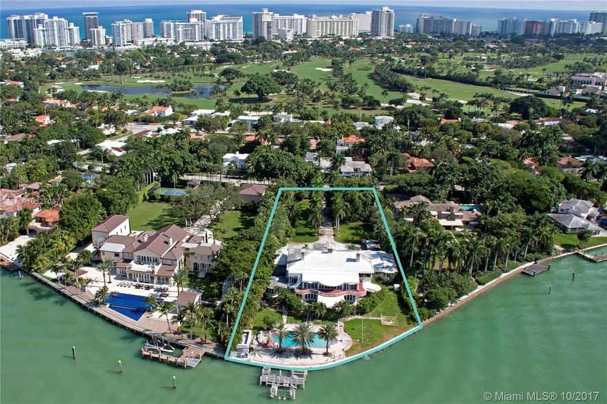 Located on prestigious North Bay Rd, this spectacular property with much history is known as Whitehall. This is one of the largest land areas available on Miami Beach w/nearly 2 acres. Wide bayfront with stunning, unobstructed views towards Downtown Miami Skyline. Built in 1956, this private bayfront estate is perfect for that special buyer seeking an exceptional opportunity to develop or renovate & restore the story of luxury of one of Miami's gems steeped in history. Deep water dockage & pool.