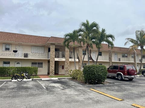 Photo of 9851 Sandalfoot Blvd #213, Boca Raton, FL 33428 (MLS # A12047805)