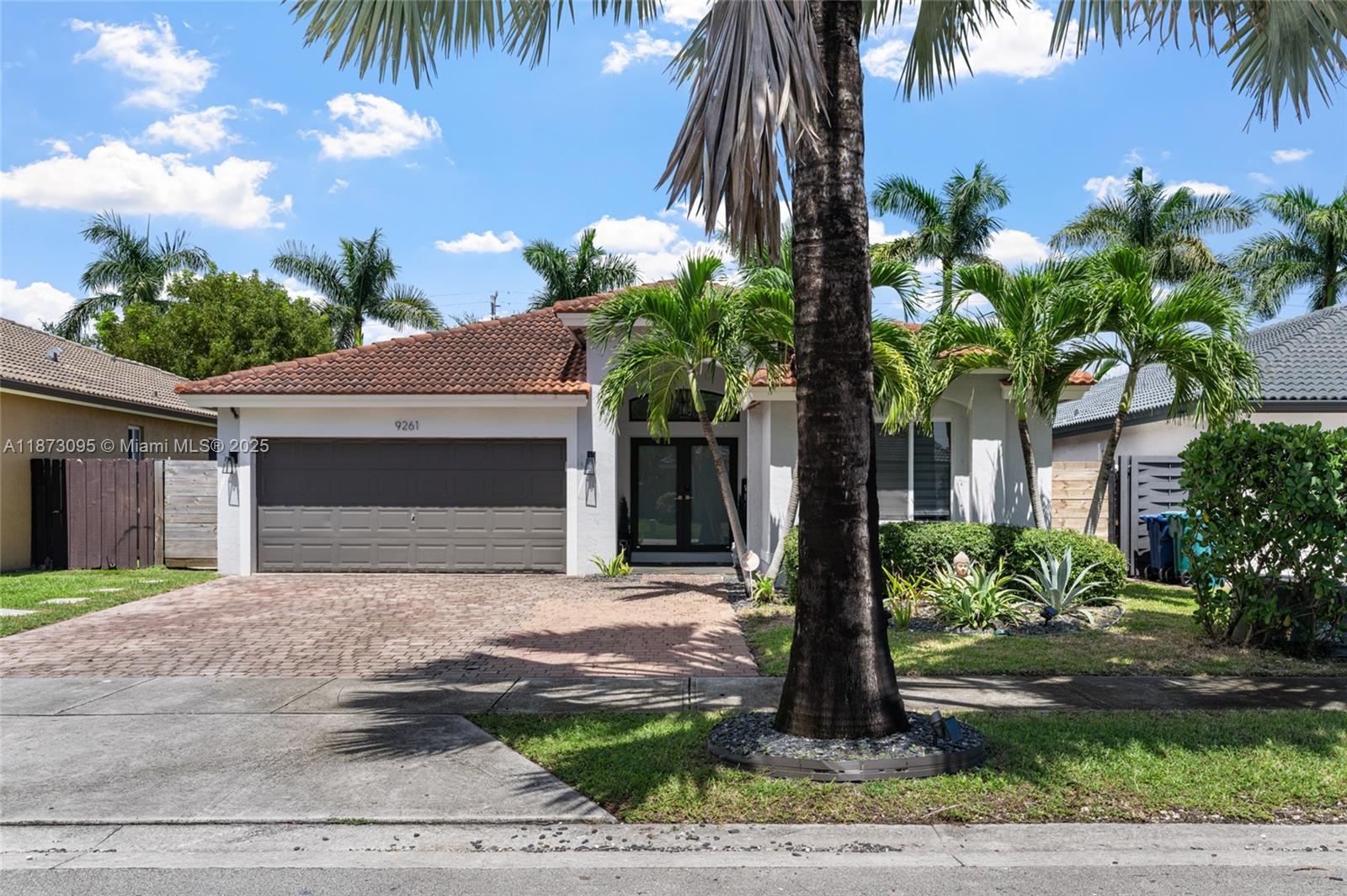 Welcome to this beautifully maintained 3-bed, 2-bath home with a 2-car garage in one of Cutler Bay’s most desirable neighborhoods. NO HOA, great friendly community vibe. Inside, enjoy soaring ceilings, an open layout, and tile & vinyl wood floors. The spacious primary suite also boasts high ceilings, creating a light-filled retreat. This home is move-in ready with an indoor laundry room. Step outside to your private, fully fenced yard with paved areas and artificial turf, ideal for entertaining, pets, or relaxing in privacy with no back neighbors. The location can’t be beat: minutes to Black Point Marina, a quick drive to Key Largo, and easy access to expressways, schools, shopping, and dining. The perfect mix of comfort, convenience, and lifestyle, don’t miss your chance to call it yours!