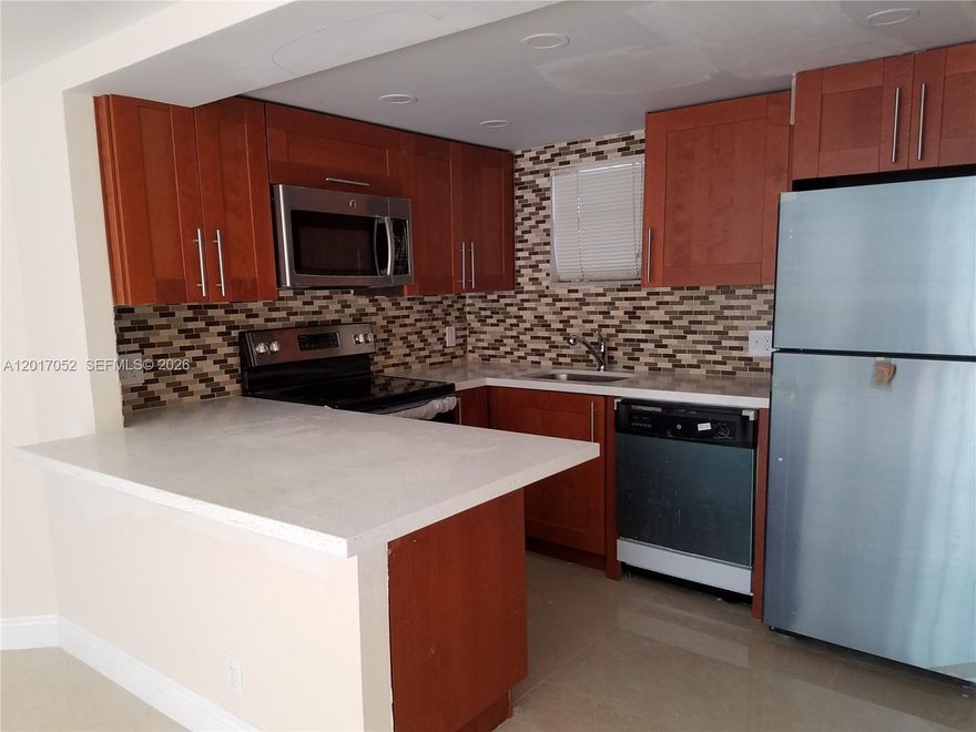 Large and spacious unit at Las Vistas at Doral! Kitchen tastefully remodeled, quartz countertop, stainless steel appliances, modern cabinetry. Porcelain tile throughout, large social area plus two large master bedrooms, each with walking closet. WASHER AND DRYER. Las Vistas is a gated community in the Downtown Doral Area that offers four swimming pools, tennis and racquetball courts, gym and clubhouse with party room and barbecue area. Close to everything!! Steps away from Downtown Doral dining and entertainment venues, access to Doral's A+ schools. Minutes from all major highways! TENANT OCCUPIED UNTIL JUNE 15TH. PLEASE CHECK BROKER REMARKS.