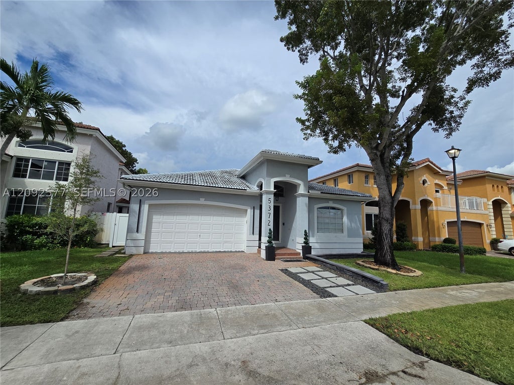 Photo of 5372 SW 131st Ter, Miramar, FL 33027 (MLS # A12092577)