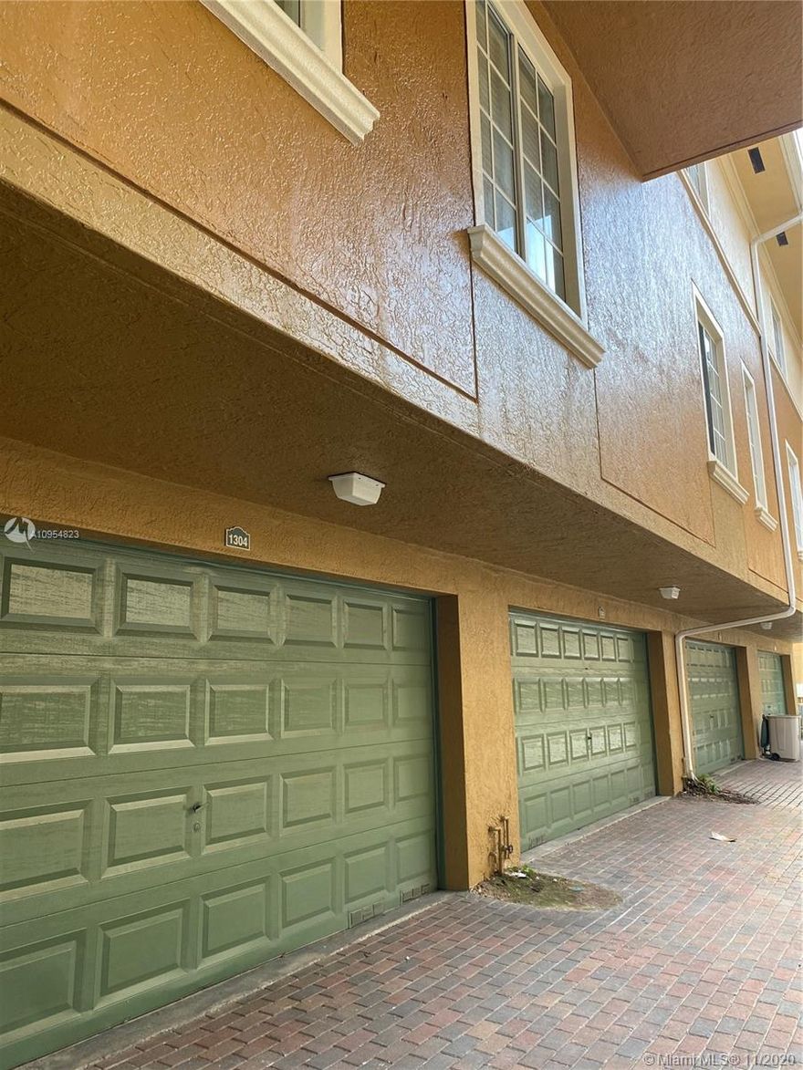 Sought after Aventi  gated community. 3 bedroom 2 bath 3 story villa with attached 2 car garage. Totally remodeled  kitchen, floors, and bathrooms. Being freshly painted ! Showing assist for appointments. Washer / Dryer inside unit in garage.