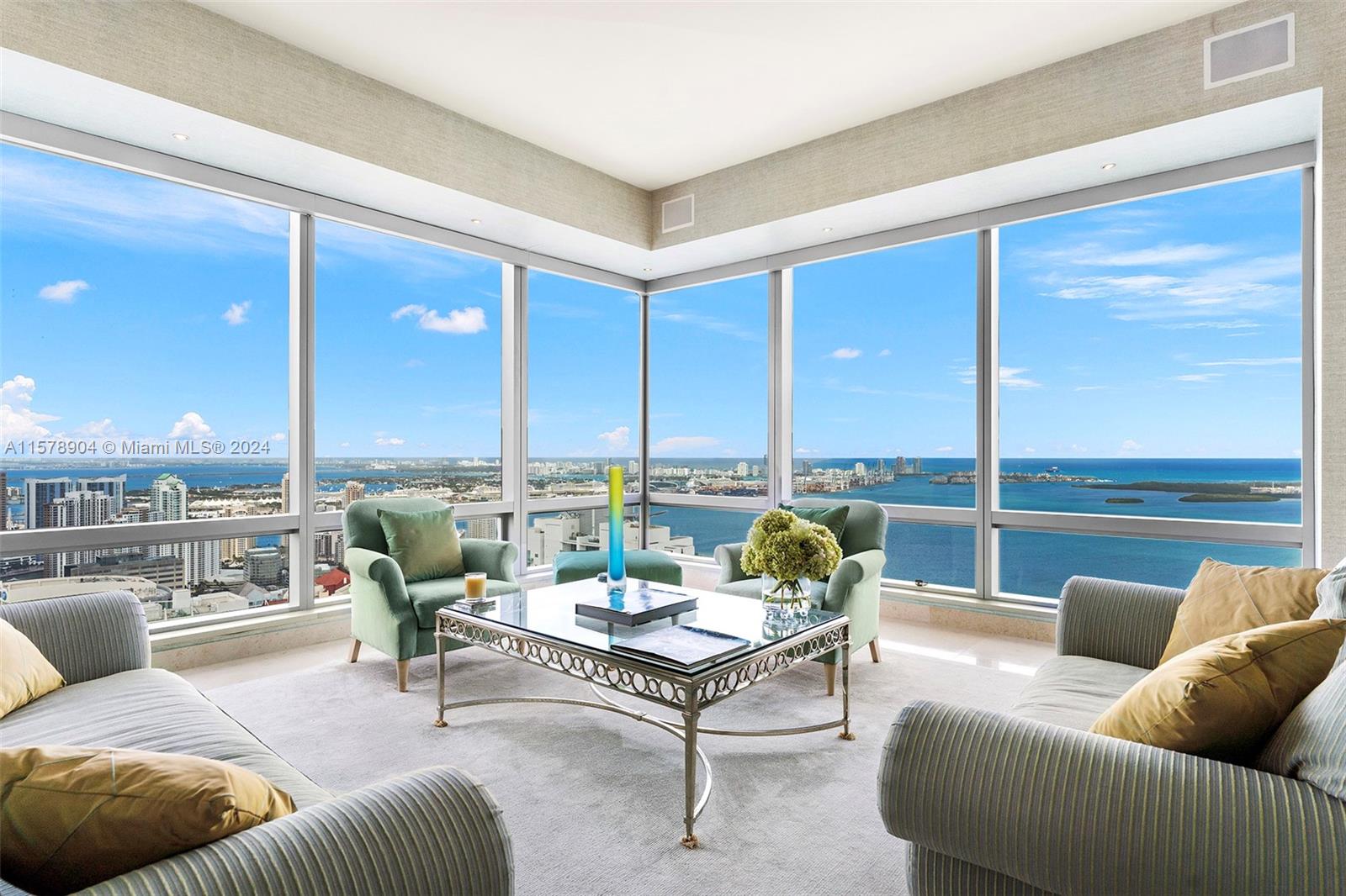 Welcome to the BEST-PRICED 3+ bedroom in the Four Seasons Residences Brickell. Offering world-class luxury & breathtaking panoramic views of the Miami skyline, Biscayne Bay & Atlantic Ocean, this 57th-floor corner residence features 3 beds/4 baths & 3,357 sq ft of space. The thoughtful split floor plan, high ceilings & 4th bedroom that has been converted into a den/office create the sense of living in a home in the sky. In addition to the private residences' amenities, concierge services, 2 parking spaces & a storage unit, enjoy the 5-star amenities & services of the Four Seasons hotel, including Equinox Fitness Club, two restaurants, room service & much more. This is an excellent opportunity not to miss. Schedule a showing today & experience the luxurious lifestyle this residence offers!