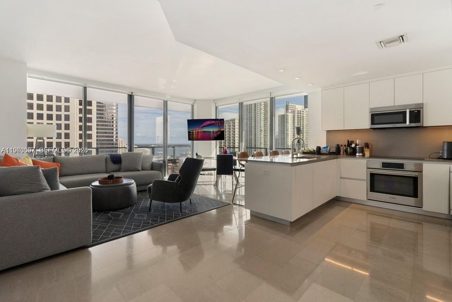 Most desirable 2 bed / 2.5 bath South-East corner unit at Reach in Brickell City Centre. It offers abundance of natural light with stunning bay and ocean views. The open kitchen is designed with Bosch appliances and extra large living space that blends with the balcony. Enjoy exclusive access to Brickell City Centre's shopping, dining, and entertainment options. The building provides 24-hour concierge service, security and valet parking. The building's expansive amenities include pools, a fitness center, playroom, business center, and spa.