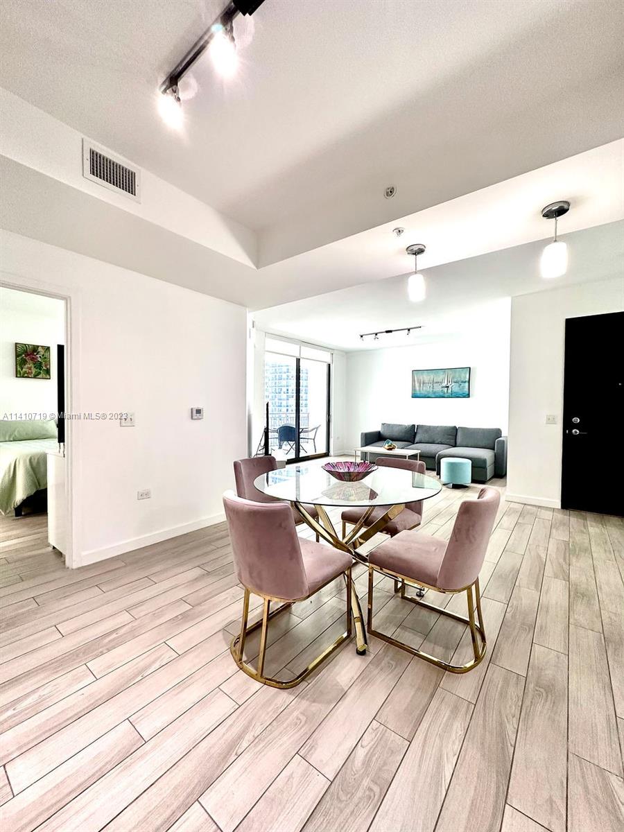 Welcome to this cozy and fully furnished executive apartment located in the heart of Brickell. Offering 1 bedroom and 1 bathroom spread across 760 sqft, this stunning residence is ideal for individuals seeking both comfort and convenience. The kitchen boasts sleek stainless steel appliances and the unit includes the added convenience of a washer and dryer inside. With its tasteful furnishings and modern amenities, this property presents an exceptional opportunity for those looking for a sophisticated living space. You'll be delighted to know that the community pool area is currently undergoing renovations and will be ready for you to enjoy by September. Don't miss out on this exceptional offering at $3,200 per month.
