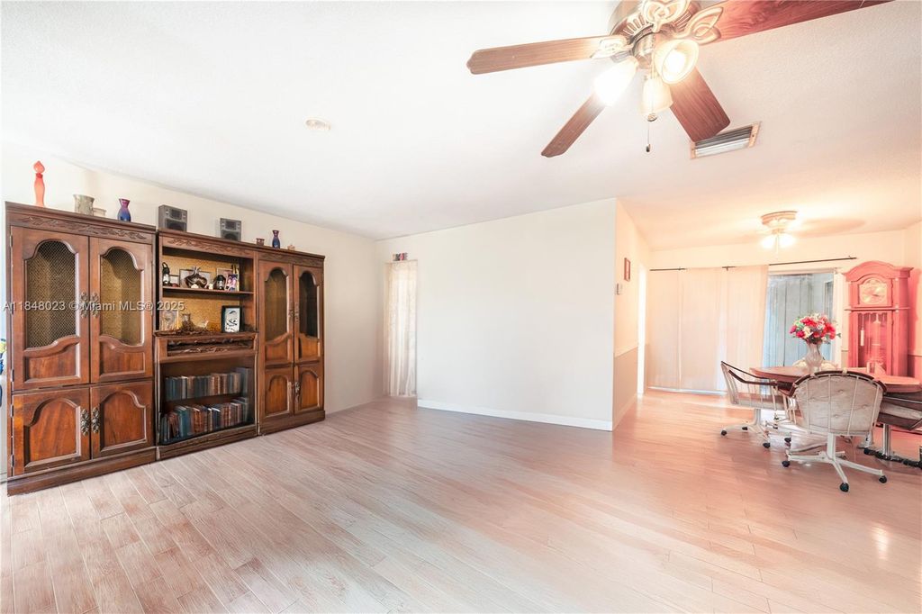 Photo of 5103 NW 54th Ct, Tamarac, FL 33319 (MLS # A11848023)