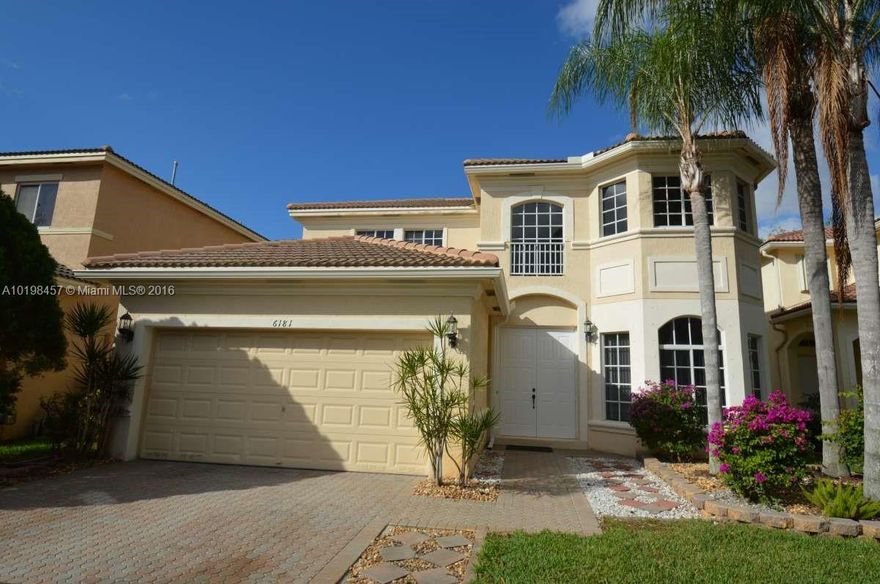 4 Bed 2.5 Bath 2 Story Home in Gated and Prestigious Laguna Isles. This Model Features the Master Bedroom on the Lower Level and has 3 HUGE Bedrooms Upstairs with a Loft as Well! Enter Through the Double Doors Into the Foyer next to a Generous Formal Living Room!  The Formal Dining Room (13x10) is steps away.  The Lower Level Powder Room Features an Upgraded Vanity/Sink. Fresh interior paint (Walls, Doors, Base, Ceilings) HUGE Paver Patio in Back! Private "Berm" Lot! Wood Floors on Stairs and ALL Beds!