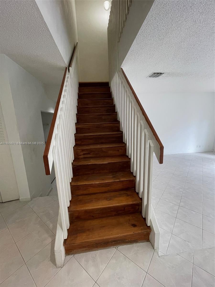 TOWNHOUSES AT JACARANDA - Residential Lease