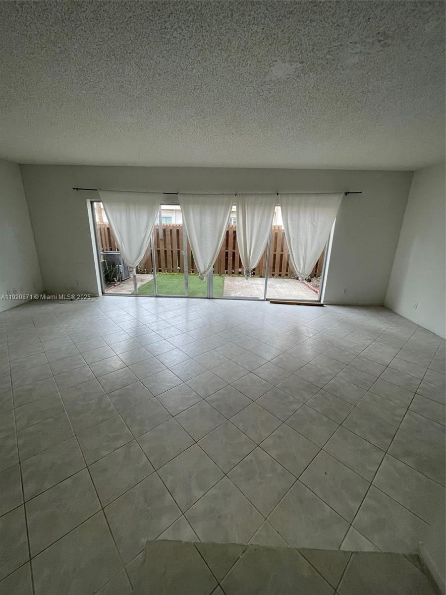 TOWNHOUSES AT JACARANDA - Residential Lease