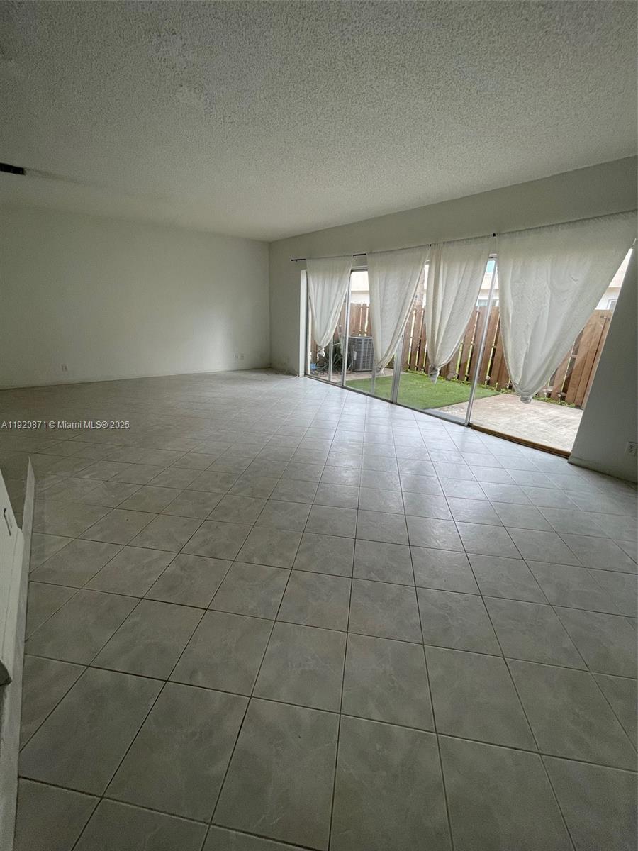 TOWNHOUSES AT JACARANDA - Residential Lease