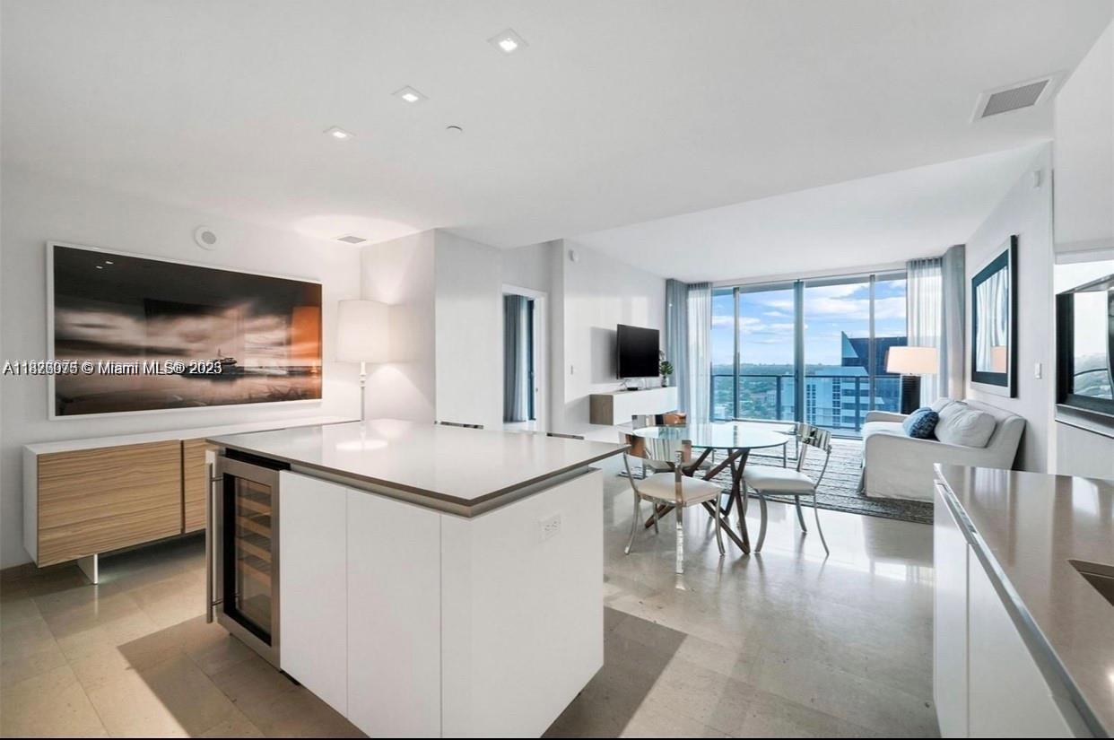 MOTIVATED LANDLORD. FULLY FURNISHED. Rise is a 43-story designed by Arquitectonica. Located in the heart of Miami (Brickell). The building features an expensive half-acre amenity deck which includes tropical gardens, barbeque grills, a Spa, outdoor fitness areas, a children's play area, restaurants, Brickell City Center Mall, and a VIP movie theater. The unit features 2 (two king-size bedrooms) plus DEN and 2.5 bathrooms plus floor-to-ceiling sliding glass doors, an oversized fully finished walk-in closet in all master bedrooms, and modern Italian cabinetry for both kitchen and bathrooms, with premium appliances package inside every unit. Ready to move in.