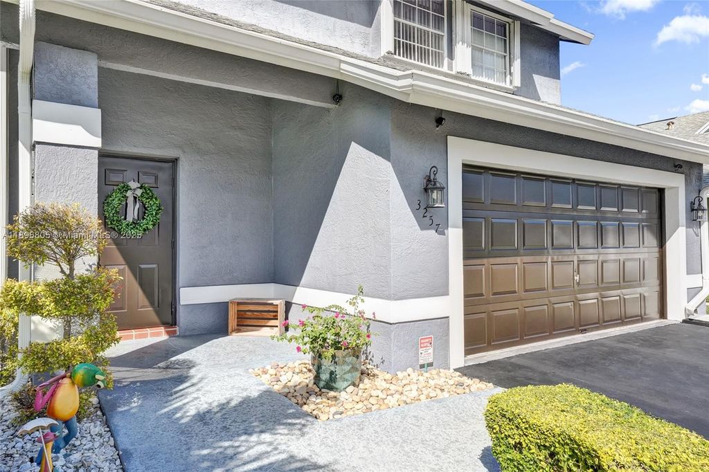 Photo of 3257 NW 121st Ave, Sunrise, FL 33323 (MLS # A11896805)