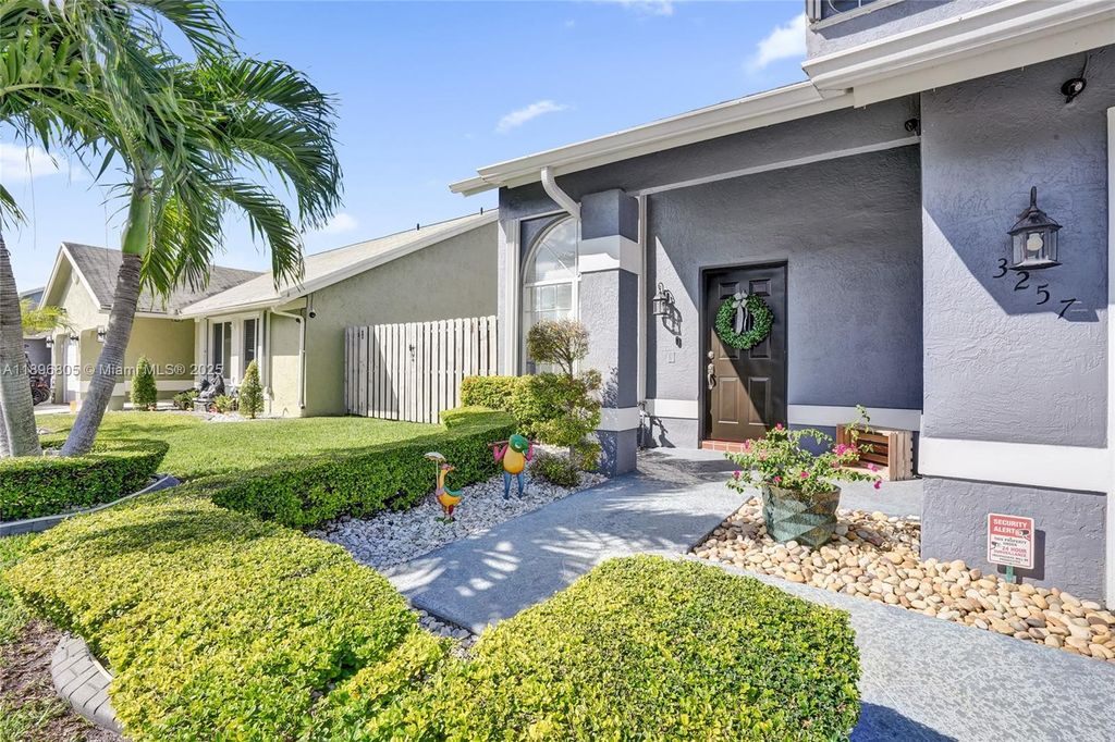 Photo of 3257 NW 121st Ave, Sunrise, FL 33323 (MLS # A11896805)