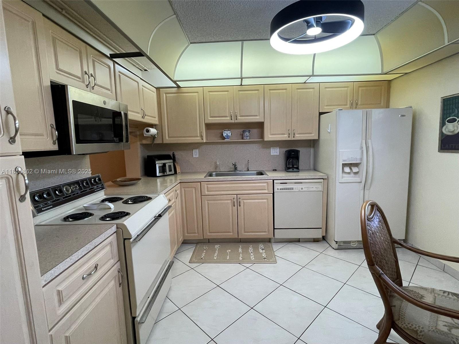 ENJOY YOUR MORNING COFFEE OR EVENING COCKTAILS ON THE BALCONY OF THIS SPACIOUS 2 BED/2 BATH UNIT, OVERLOOKING THE CANAL, IN THE LAKES OF CARRIAGE HILLS! LARGE, REMODELED KITCHEN W/LOTS OF CABINETS AND COUNTER SPACE. OVERSIZED SPLIT BEDROOMS WITH MASTER SUITE HAVING WALK IN CLOSET, DRESSING AREA AND WALK IN SHOWER. RENOVATED SECOND BATH WITH TUB/SHOWER COMBO. LAUNDRY ROOM WITH FULL SIZE WASHER AND DRYER AND MORE STORAGE SPACE! BREAKFAST NOOK W/PLENTY OF NATURAL LIGHT. SPACIOUS LIV/DIN AREA, ADULT COMMUNITY WITH LOADS OF AMENITIES INC POOL, PICNIC AREA, TENNIS, CLUBHOUSE AND ASSOC FEE INC WATER, SEWER, TRASH, WIFI AND CABLE – ASSESSMENTS WILL BE PAID IN FULL AT CLOSING BY SELLER - DON’T WAIT ON THIS ONE – SCHEDULE YOUR SHOWING TODAY!