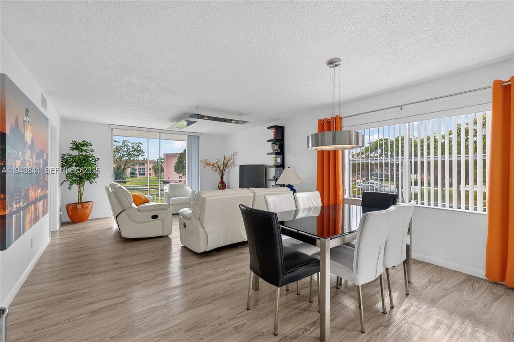 Photo of 9481 Sunrise Lakes Blvd #210, Sunrise, FL 33322 (MLS # A11943841)