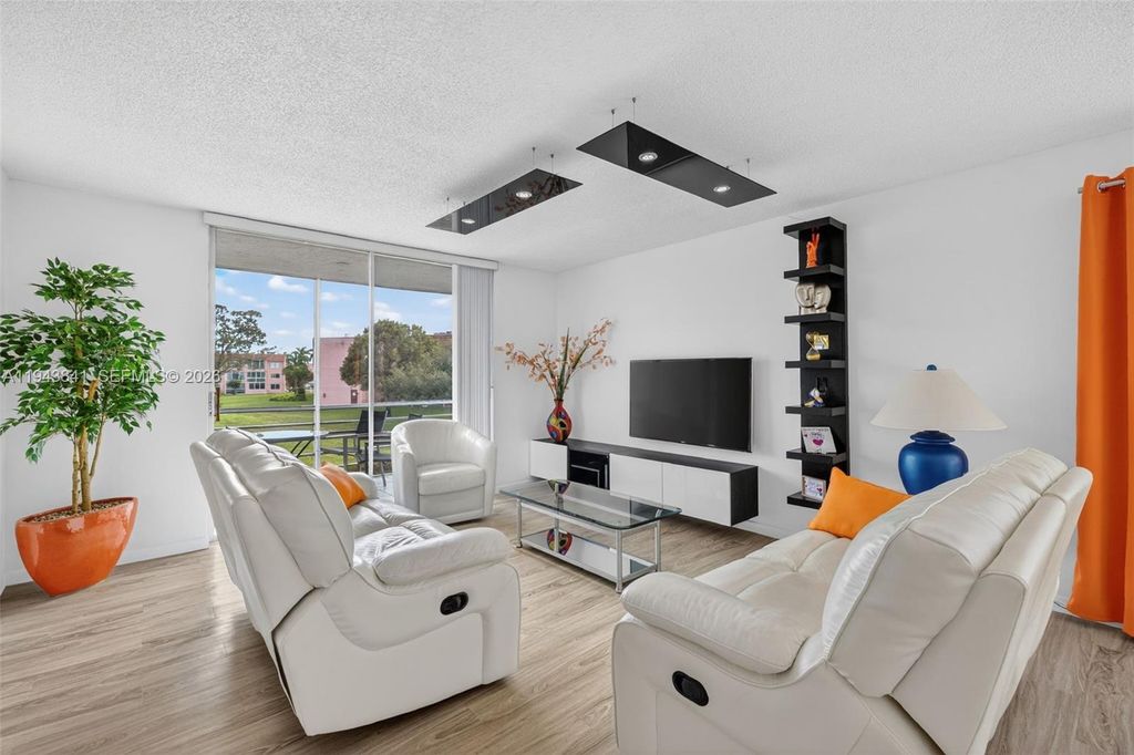 Photo of 9481 Sunrise Lakes Blvd #210, Sunrise, FL 33322 (MLS # A11943841)