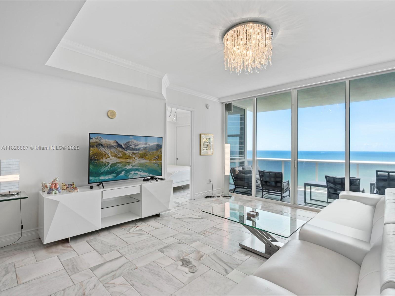 Welcome to Trump Palace. Experience luxury living at its finest in Sunny Isles Beach, Florida's Riviera. Enjoy prime ocean front living in this 2 bed 2.5 bath unit. Unit has been remodeled, and includes automated window treatments, Italian marble flooring throughout. Unit is offered fully furnished. Trump Palace is a gated condominium offering resort style amenities such as restaurants, bars, full service pools and beach, tennis, soccer, gym, spa, 24-hr concierge, and more! Walking distance to dining, shops, and places of worship. Enjoy a life of luxury and convenience.
