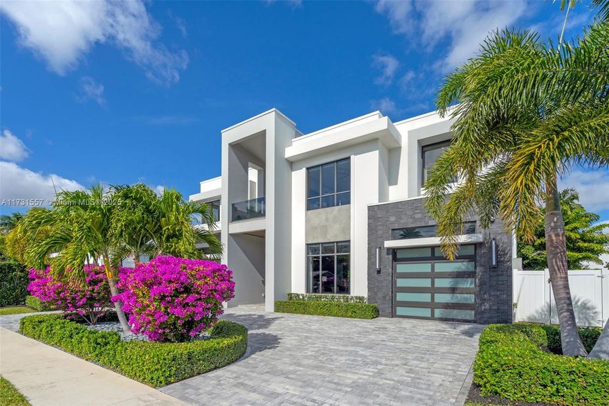 Prime location! …Experience the highly sought-after Golden Triangle neighborhood. This stunning custom designed estate is situated in prestigious Boca Villas steps from Mizner park and minutes from pristine beaches and Boca Beach Club.  This elegant home has five bedrooms, six bathrooms and 4326 square feet of luxurious living. Enjoy an open floor plan and backyard oasis featuring a heated saltwater pool and covered patio, perfect for year round enjoyment. Additional highlights include state of the art kitchen equipped with top tier appliances, smart home automation, three car garage, 38 KW generator.  This home seamlessly blends elegance, comfort and convenience in a prime location. 

Schedule your tour today to experience this exceptional property.