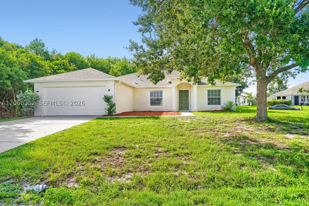 Photo of 591 SW Millard Dr, Port St Lucie, FL 34953 (MLS # A12060332)