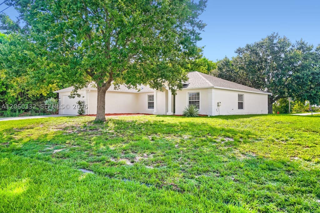 Photo of 591 SW Millard Dr, Port St Lucie, FL 34953 (MLS # A12060332)
