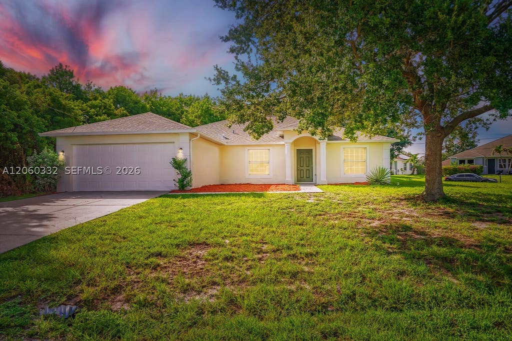 Photo of 591 SW Millard Dr, Port St Lucie, FL 34953 (MLS # A12060332)
