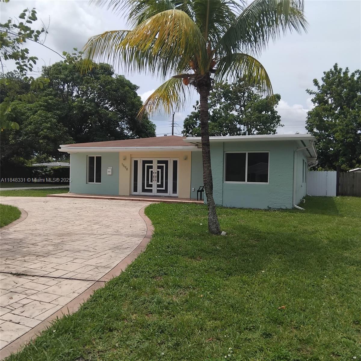 Beautiful 4-bed & 2-bath remodeled single family home with a family room and extra dent in North Miami Beach remodeled, this 1,752 sq ft residence features white tile flooring throughout, impact windows, and a bright open layout with a dining/living room combo and breakfast area. The updated kitchen includes stainless steel appliances. Primary bedroom and additional bedrooms are located on the ground level, with both a tub and shower in the primary bath. Enjoy outdoor living with a fenced yard, patio, fruit trees. Additional features a car driveway, washer/dryer in-unit. Located on a 7,151 sq ft lot in a quiet neighborhood with easy access to shopping, schools, and highways. Property is clean and ready to move-in.