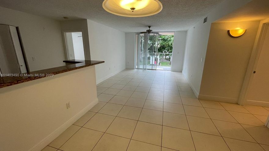 Beautiful and spacious 2 bedroom/2 bath unit with new wood flooring and just painted!  Unit is in great condition, ready for move in.  Large open kitchen, split bedroom plan, washer and dryer in unit and balcony.  Unit comes with 2 assigned parking spaces.  Community is well maintained and offer pool, fitness area and more!  Pets ok with pet deposit.