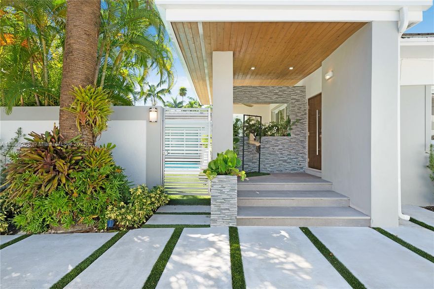 Welcome to 1616 S Bayshore Dr—a beautifully maintained residence offering 4 bedrooms, 4.5 bathrooms, and 3,500 SF of comfortable space in the heart of Coconut Grove. The home features a large foyer that opens to generous living and dining areas, including a spacious family room. Bright, open-concept layout with modern lighting, marble flooring, stainless steel appliances, double ovens, sleek cabinetry, and ample storage. The secluded primary suite is located in its own wing, providing privacy and tranquility, and includes a marble bath with Jacuzzi tub, walk-in shower, and large vanity with abundant storage. Lush, manicured landscaping surrounds the property with a private pool, multiple patio and terrace spaces ideal for relaxing or entertaining.