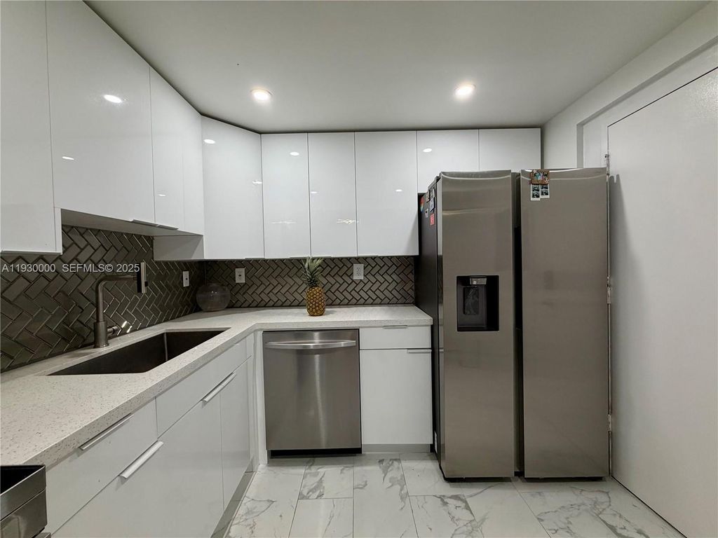 Photo of 1833 S Ocean Dr #609, Hallandale Beach, FL 33009 (MLS # A11930000)