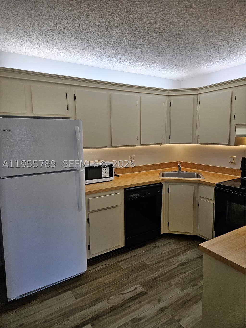 Photo of 441 Pine Glen Ln #A-2, Green Acres, FL 33463 (MLS # A11955789)
