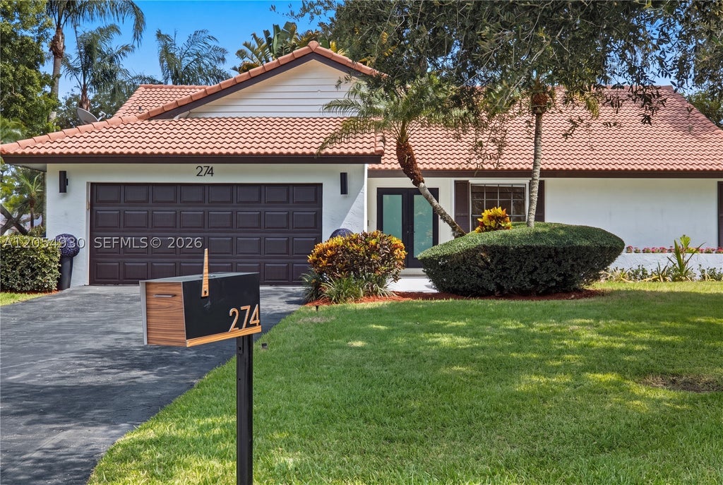 Photo of 274 NW 107th Ave, Coral Springs, FL 33071 (MLS # A12054930)