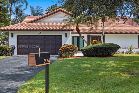 Photo of 274 NW 107th Ave, Coral Springs, FL 33071 (MLS # A12054930)