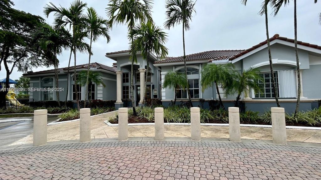 Photo of 155 NW 96th Ter #2-201, Pembroke Pines, FL 33024 (MLS # A11931266)