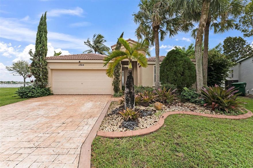 Welcome to this stunning, 3-bed, 2-bath residence on an oversized lot in the prestigious, gated community of Riviera Isles. Tucked away on a cul-de-sac, this home offers privacy, elegance, and panoramic lake views. Includes a den perfect for a home office, guest suite or turn into a 4th bedroom. The spacious, fully fenced backyard with 133 linear feet of lake frontage offers ample room for a pool, outdoor kitchen, or even a cabana house.