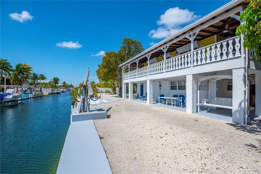 Embrace the serene beauty of island living with this delightful 2-bedroom, 2-bathroom home nestled on a double-fenced lot in Big Pine Key. Perfectly positioned along a scenic canal, this property offers Southern charm, with an inviting wraparound porch to enjoy the gentle breeze and picturesque views. This home is ideal for both relaxation and entertaining. Step outside to a seawall that leads directly to the water, offering easy access for boating and water activities. Whether you're a seasoned boater or a weekend enthusiast, this canal-front location provides fantastic opportunities for adventure right at your doorstep. The property offers plenty of storage space, ensuring room for all your gear and toys. There's even space to add a pool for those sunny Florida days. A garage adds to the convenience, making this home both functional and full of potential. Don't miss the chance to own this piece of paradise, where comfort, coastal living, and a vibrant island lifestyle meet.