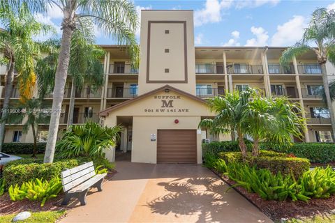 Photo of 901 SW 141st Ave #405M, Pembroke Pines, FL 33027 (MLS # A11960643)