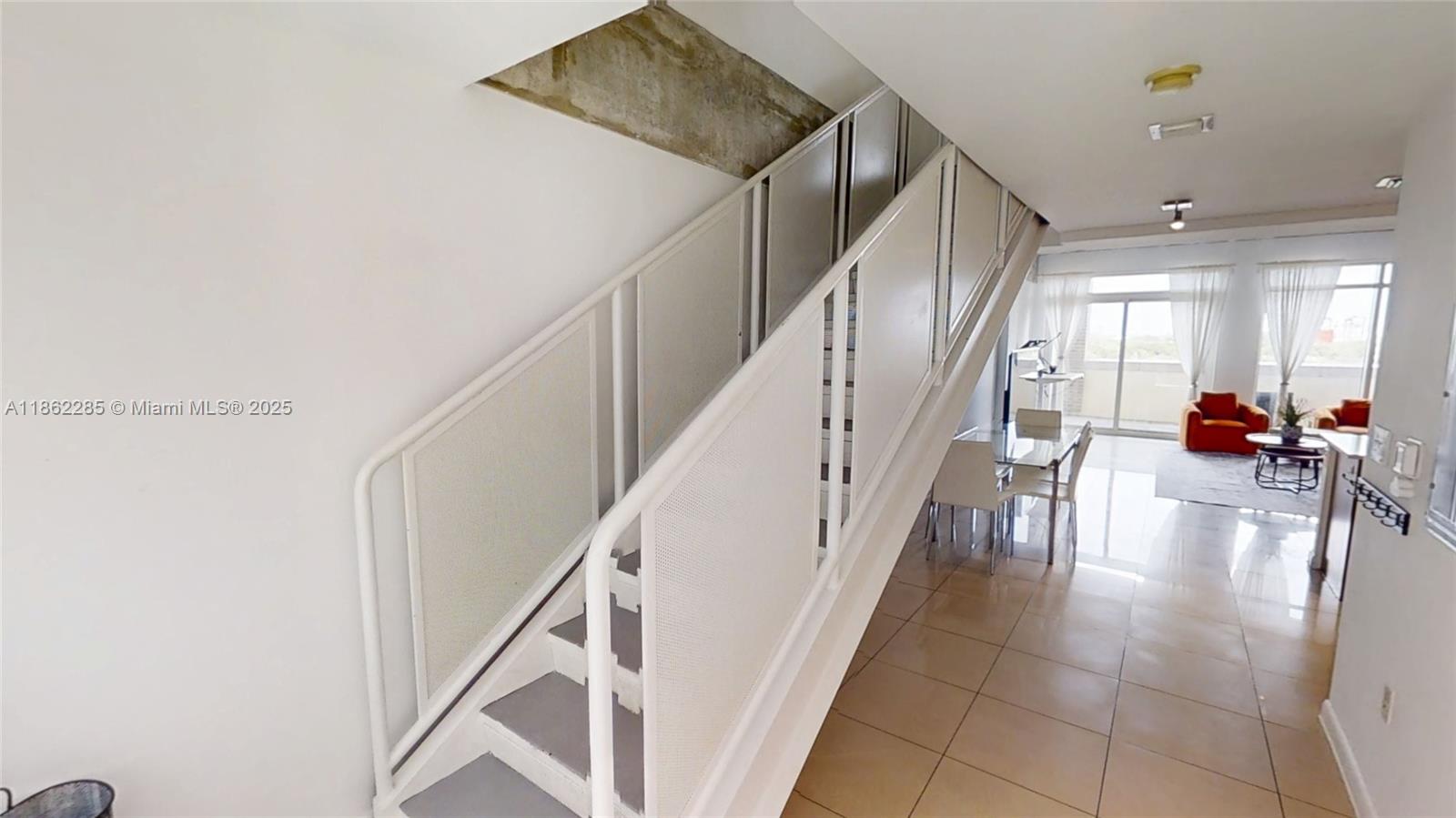 Unique Two Story 2bed/2bath townhome in excellent condition at Midblock in the heart of Midtown. Tastefully furnished with floor to ceiling impact windows and 3 balconies with sunset & city views. Guest bathroom downstairs. Resort-style amenities including a rooftop pool, BBQ grill & cabanas, fitness center, putting green, 24 hr. security and concierge. One garage parking space included. Located steps from top-rated restaurants, art galleries, shopping and centrally located just minutes to Wynwood, Design District, and Miami Beach. Wonderful community of early morning coffee crowd at the park & pet owners walking the neighborhood daily.