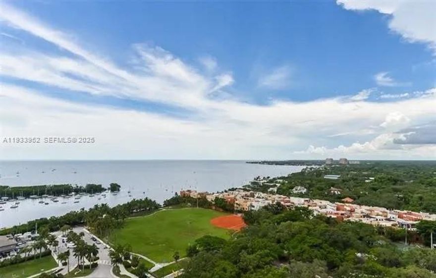 Vibrant evening sunsets where the bay meets your everyday  Magnificent one-bedroom residence with two full baths in the heart of Coconut Grove. This stunningly renovated unit features a designer kitchen, high-impact sliding doors, and a flexible two-key split floor plan—perfect for generating rental income. Enjoy breathtaking Biscayne Bay views, gorgeous sunsets, and a private balcony for relaxing or entertaining. With no rental restrictions and a proven history of strong revenue, this property is both a dream getaway and a smart investment. Ideally located within walking distance to Coconut Grove’s premier restaurants, boating, parks, and nightlife, this residence offers the ultimate Grove lifestyle in a full-service condo-hotel setting.