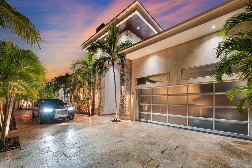 Behold this absolute modern masterpiece, custom built & designed by Prestige Construction. This gated utopia boasts unique over the top features; including a 3-car gallery like garage visible from the interior, a glass-enclosed gym, sophisticated home office, 14ft ceilings, and an aquatic feature with water cascading into the impressive pool area below, multiple seating areas, summer kitchen, and outdoor shower. Designer finishes throughout, a spacious chef's kitchen, and a 100-bottle temperature controlled glass wine cellar. Located 10 minutes from Las Olas, Pine Crest School, minutes from Galleria Mall, Coral Ridge Country Club, and the beach! Rare opportunity to own this one-of-a-kind residence. Call listing agent for exclusive showings. (4,044 SqFt under air as per owner)