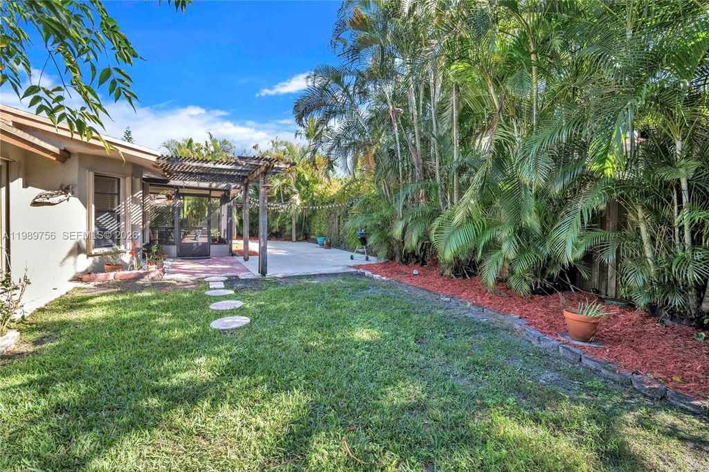 Photo of 9300 NW 32nd Mnr, Sunrise, FL 33351 (MLS # A11989756)