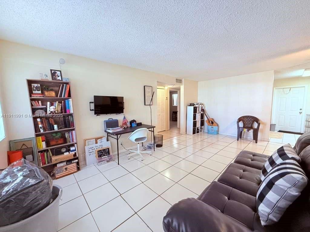 Photo of 850 E Commercial Blvd #109A, Oakland Park, FL 33334 (MLS # A11911991)