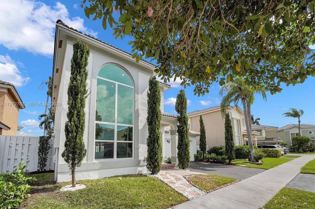 Photo of 4221 NW 55th Dr, Coconut Creek, FL 33073 (MLS # A11972783)