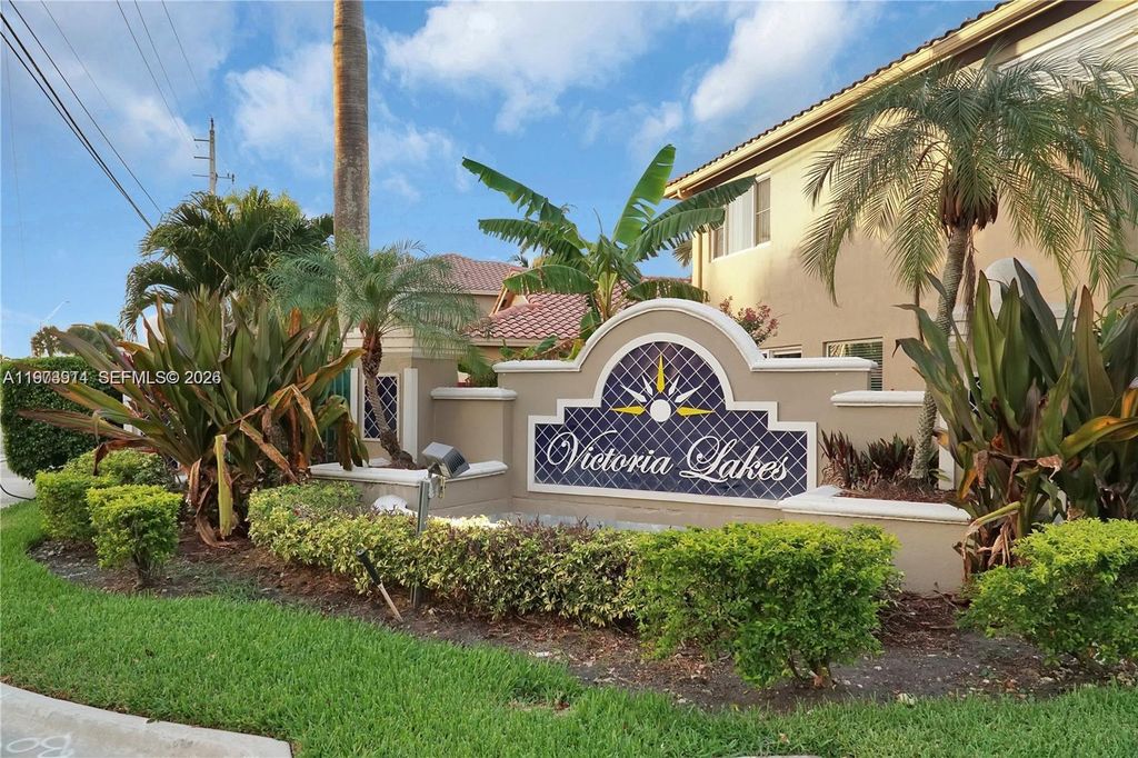 Photo of 2150 NW 100th Ave, Pembroke Pines, FL 33024 (MLS # A11973914)