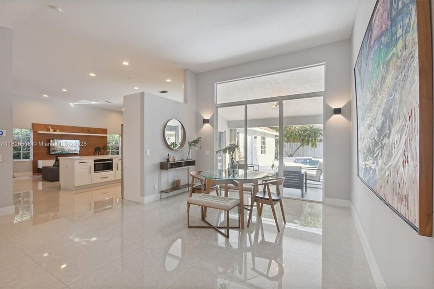 Experience living in this exquisite renovated ONE-STORY home featuring 5 beds, 3.5 baths & open living areas with HIGH ceilings in Weston’s prestigious North Lake Community. The expansive open floor plan features modern tile floors, family room, living & dining rooms offering plenty of space for entertainment. Boasting stunning eat-in kitchen w/ S.S appliances & granite countertops. Step in the master suite accompanied by a full en-suite bath & walk-in closets w/ tub/shower. Across, 2 beds await w/ 2 1/2 bath & the 5th beds is perfect as an office. Step outside to your cozy fenced, partially roofed patio, tiled w/ artificial grass, POOL, Cabana BATH & RENOVATED DECK ideal for outdoor relaxation. Pool-fenced. Steps away from the CUL-DE-SAC.