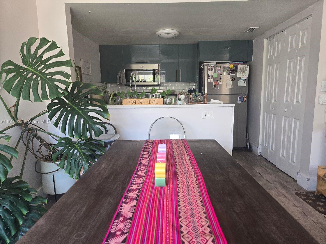 Centrally located corner unit close to restaurants, supermarkets, shops and many other services, minutes away from Miami International Airport, Nicklaus (former Miami) Children's Hospital, Tropical Park and highways offers two bedrooms upstairs with a full bathroom each, half bathroom on the first story, renovated kitchen and floors and newly appliances including washer, dryer, stainless steel refrigerator, e-range, microwave and dishwasher. Complex has a patrol officer at night, two pools, racquetball court and two tennis courts. Parking is assigned in front of the unit and guest parking throughout the community.