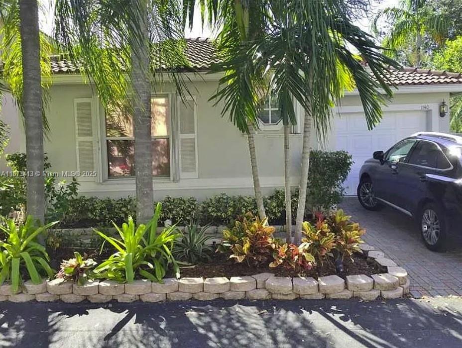 Rare Single-Story Corner Lot!
Move-in ready 3BR/2BA with new 2025 roof, one-car garage, and open split-bedroom layout. Upgraded kitchen with granite, stainless steel appliances & wood cabinets. Enjoy a private patio oasis—perfect for entertaining or relaxing—accessible from the living room and primary suite.
Just steps to resort-style amenities: heated pool, fitness center, tennis/pickleball, basketball, playground & clubhouse. 24/7 guard-gated West Lake Village only 1 mile to the beach and minutes to airport, shopping & dining.
Hurricane shutters throughout. Rare find—schedule your showing today!